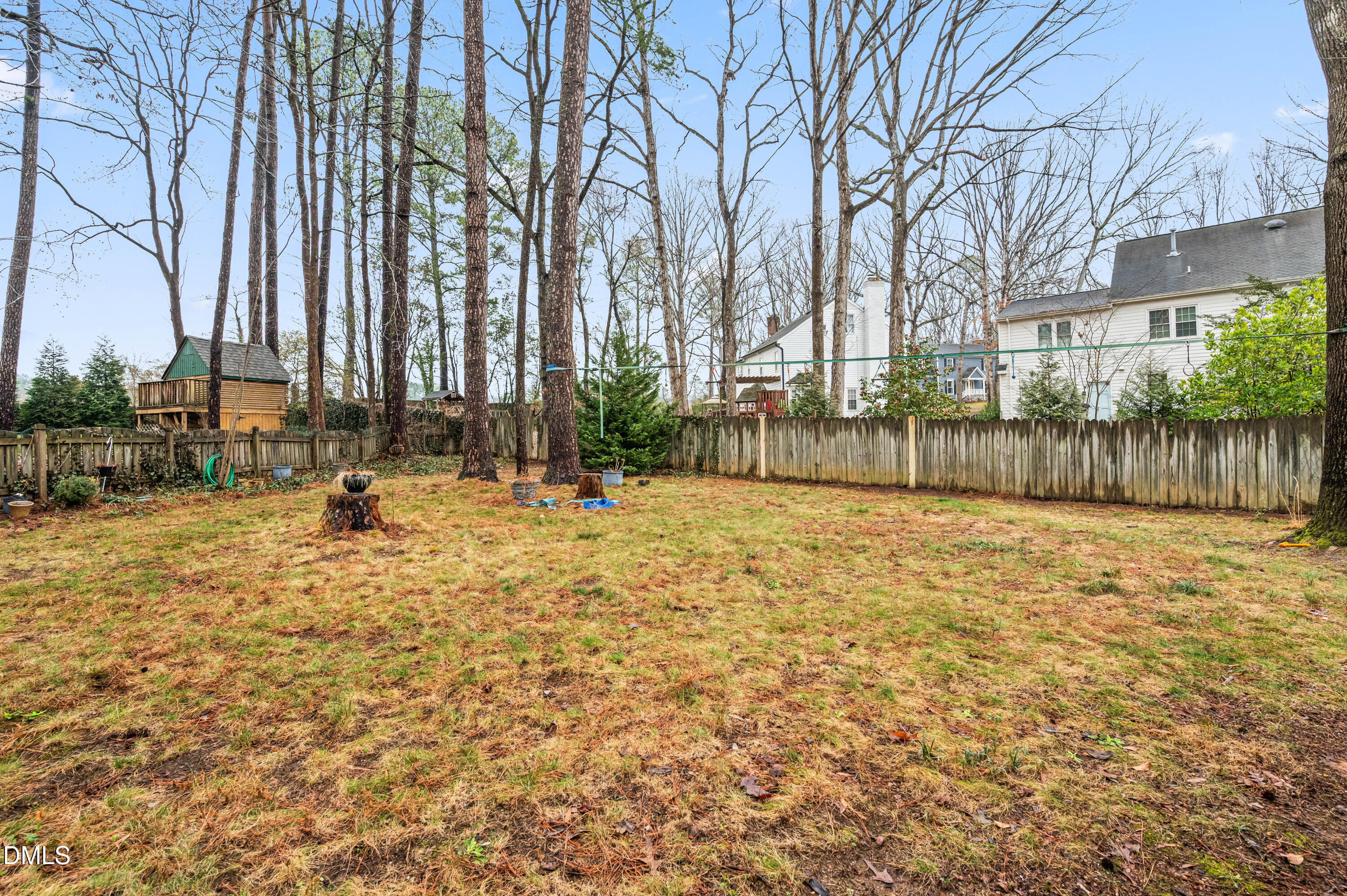 8304 North Crestwyck Court Raleigh, NC 27615 - Photo 35 of 40 a view of swimming pool with a bench