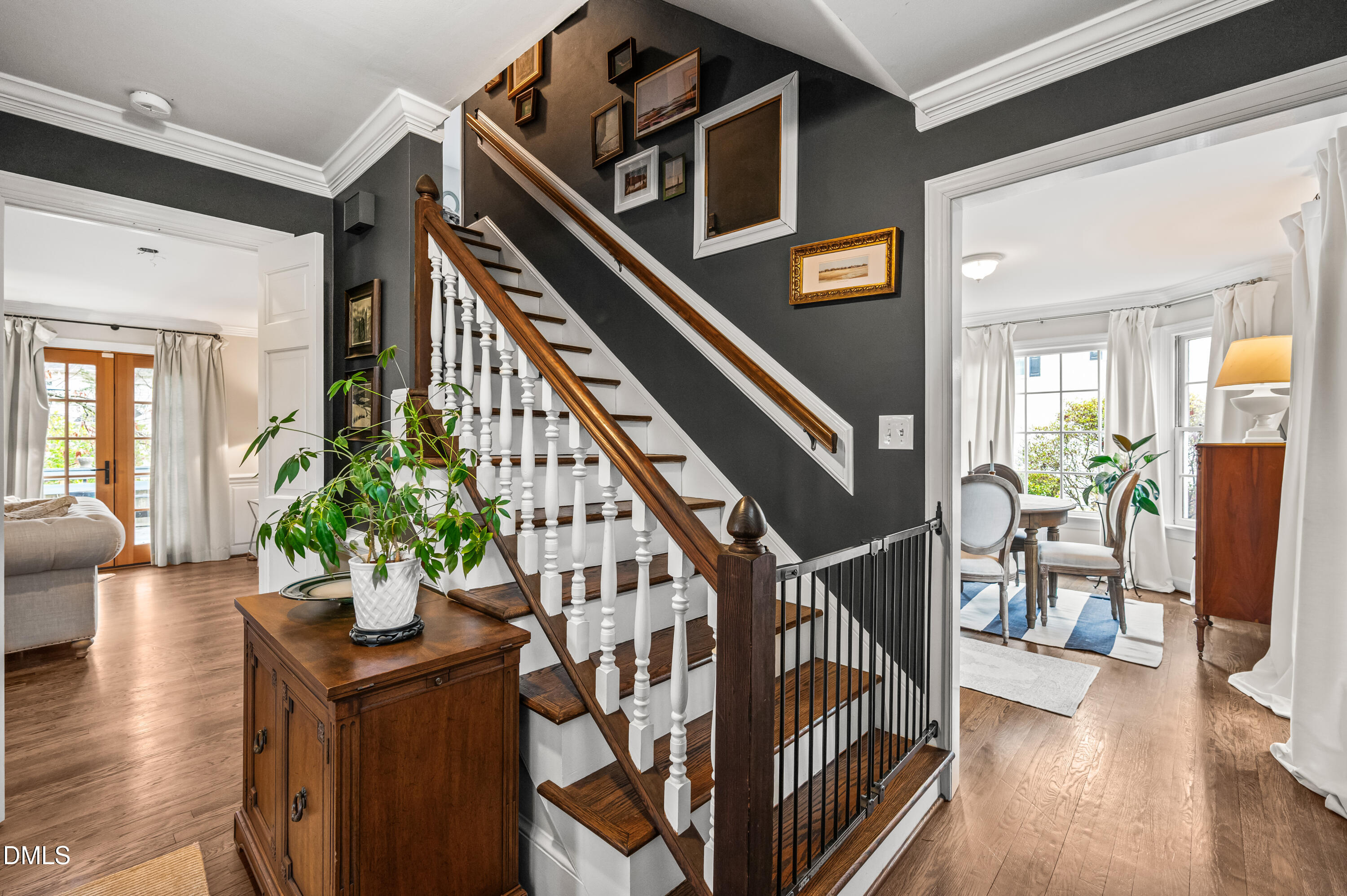 8304 North Crestwyck Court Raleigh, NC 27615 - Photo 6 of 40 a view of entryway and hall with wooden floor
