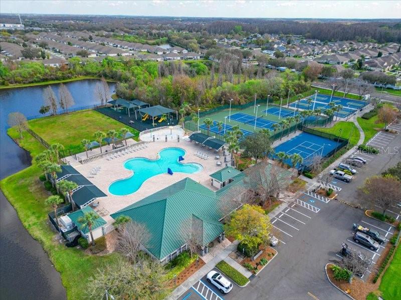 29924 Playa Del Rey Lane Wesley Chapel, FL 33543 - Photo 27 of 31 an aerial view of a house with a garden
