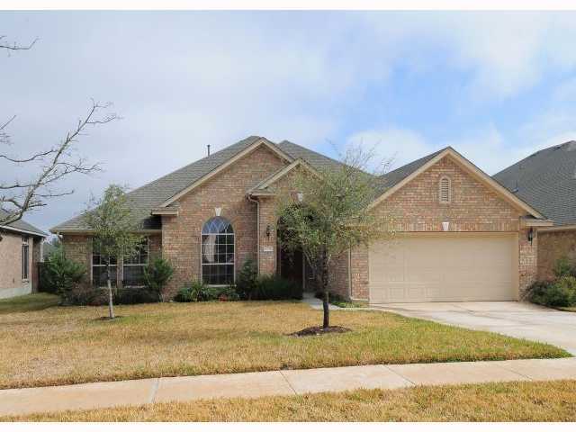 16228 Wynstone Lane Austin, TX 78717 - Photo 1 of 1 a front view of a house with a yard and garage