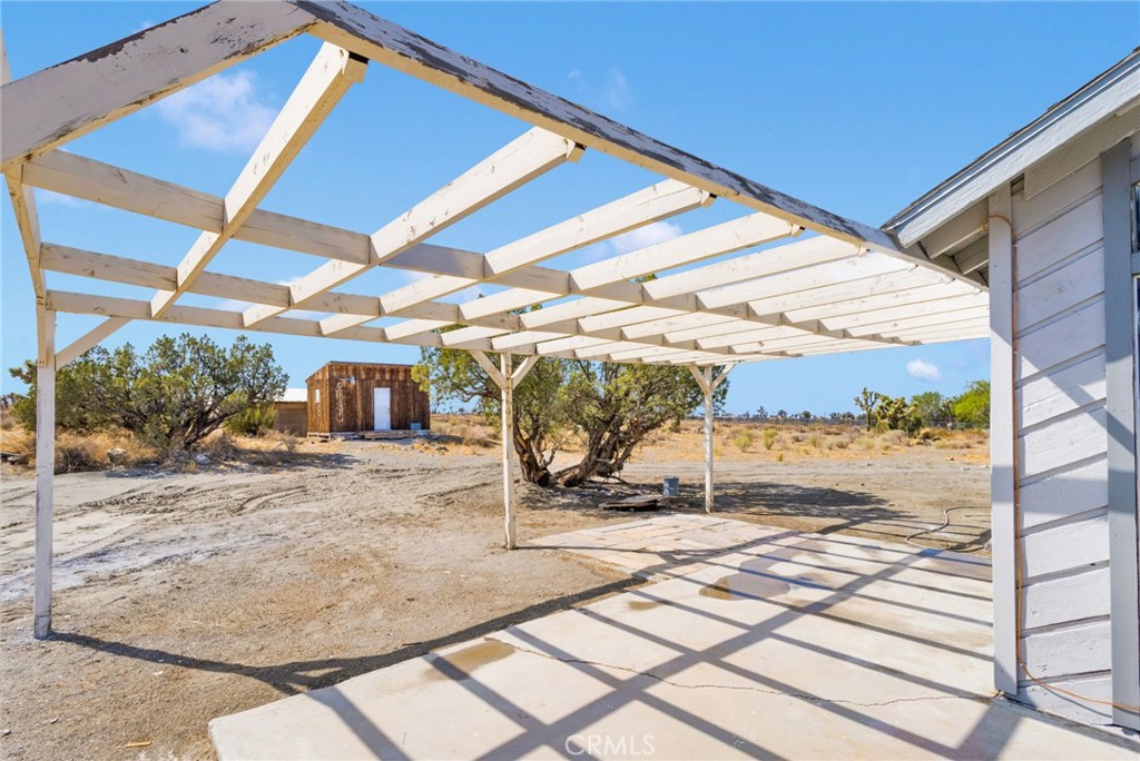 11076 Wagon Train Road Pinon Hills, CA 92371 - Photo 20 of 24 a view of a parking space