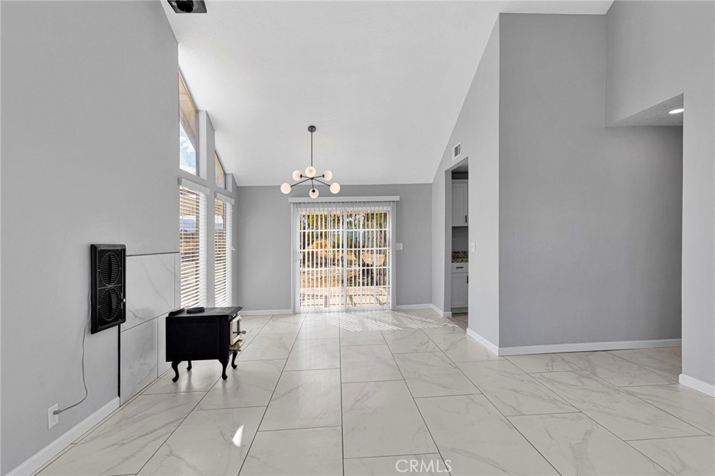 11076 Wagon Train Road Pinon Hills, CA 92371 - Photo 6 of 24 a view of an empty room with a window