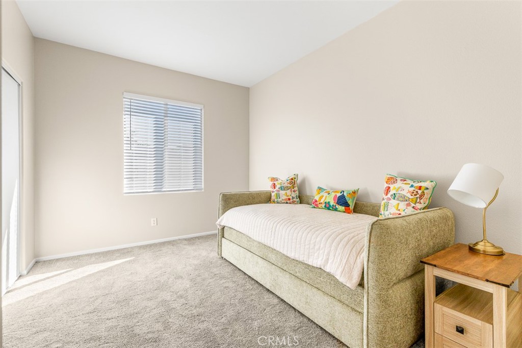 638 Sumner Way Oceanside, CA 92058 - Photo 13 of 17 a bedroom with a bed and a window