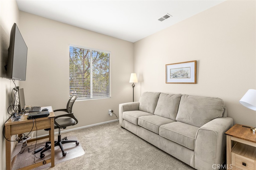 638 Sumner Way Oceanside, CA 92058 - Photo 10 of 17 a living room with furniture and a flat screen tv
