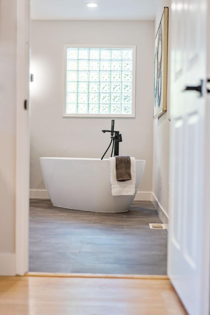 1720 Havenhurst Drive Los Altos, CA 94024 - Photo 18 of 49 a bath tub sitting next to a window