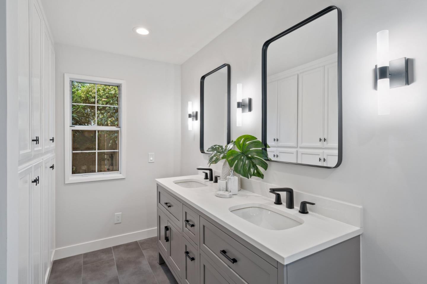 1720 Havenhurst Drive Los Altos, CA 94024 - Photo 19 of 49 a bathroom with a sink and a mirror