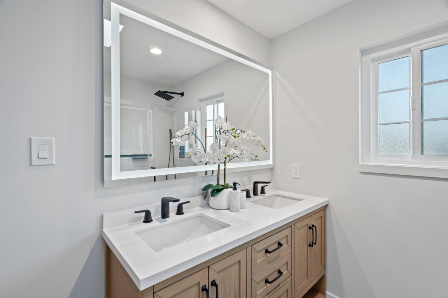 1720 Havenhurst Drive Los Altos, CA 94024 - Photo 22 of 49 a bathroom with a sink and a mirror