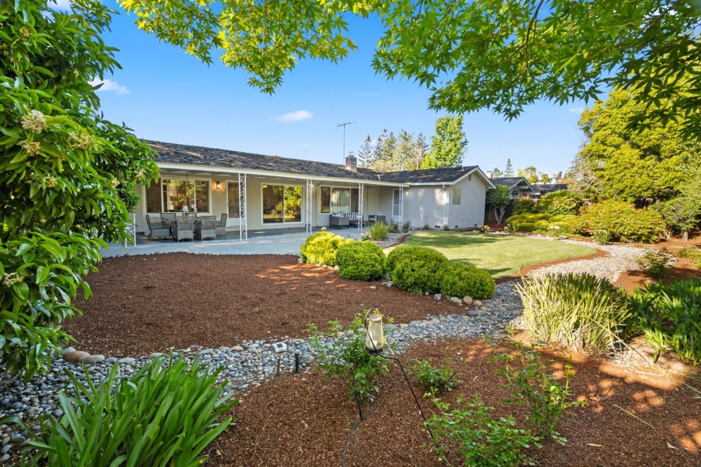 1720 Havenhurst Drive Los Altos, CA 94024 - Photo 37 of 49 a front view of a house with a yard and trees