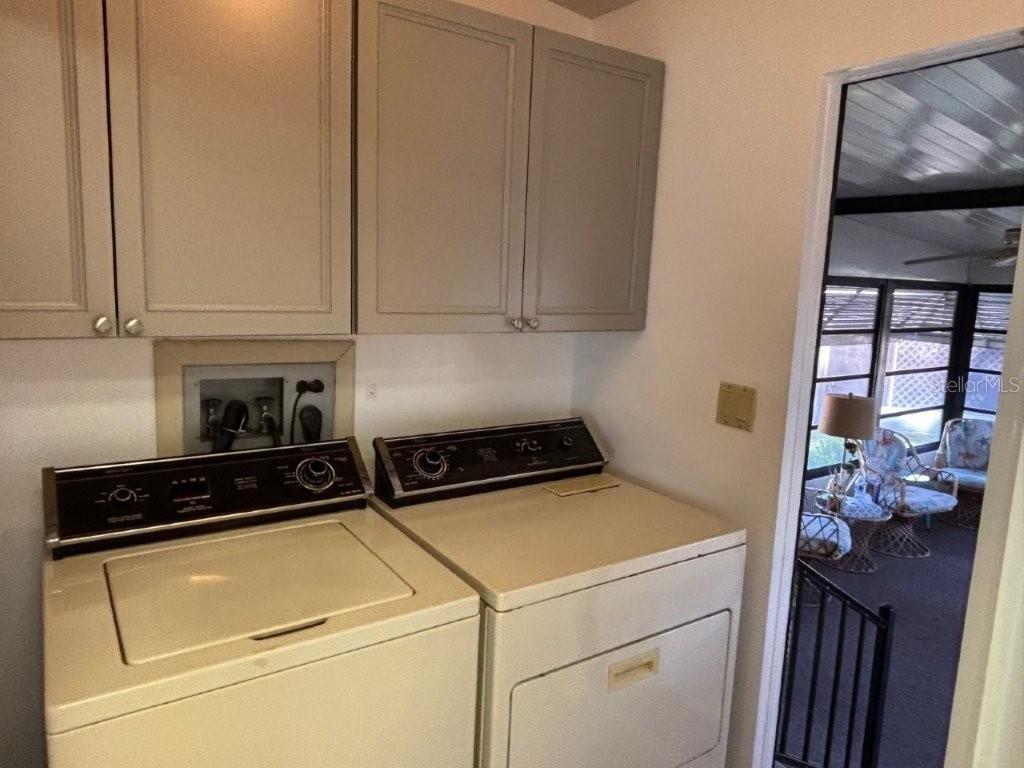 617 Webb Way Lady Lake, FL 32159 - Photo 4 of 15 a utility room with dryer and washer