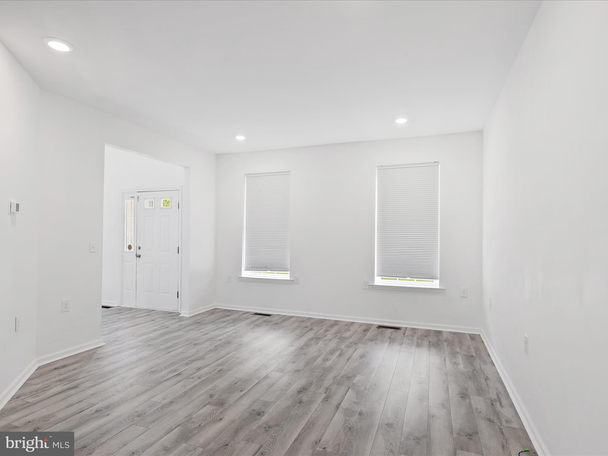 38368 Whaleys Road Delmar, DE 19940 - Photo 4 of 26 Front Door opens to Open Living Room + Dining Room