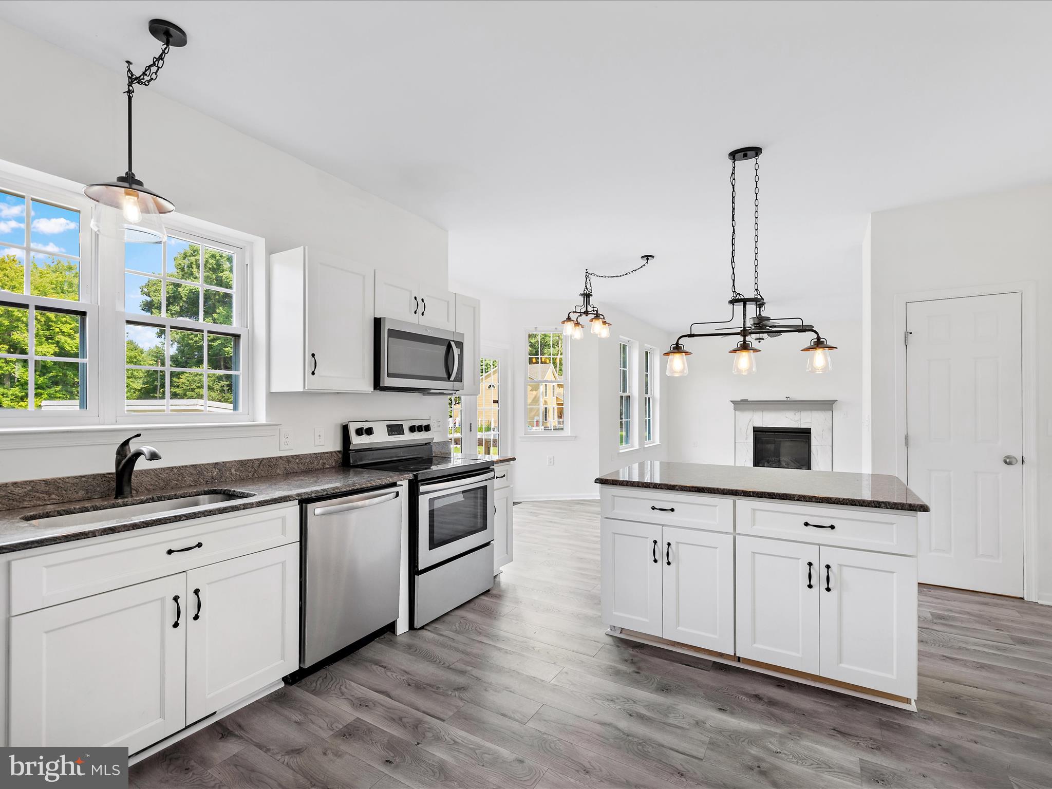 38368 Whaleys Road Delmar, DE 19940 - Photo 7 of 26 Large Kitchen with Island opens to Family Room