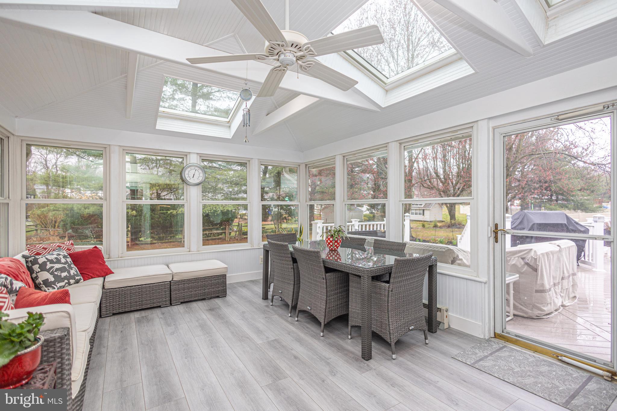 649 Teich Drive Yardley, PA 19067 - Photo 20 of 63 a living room with furniture and a floor to ceiling window