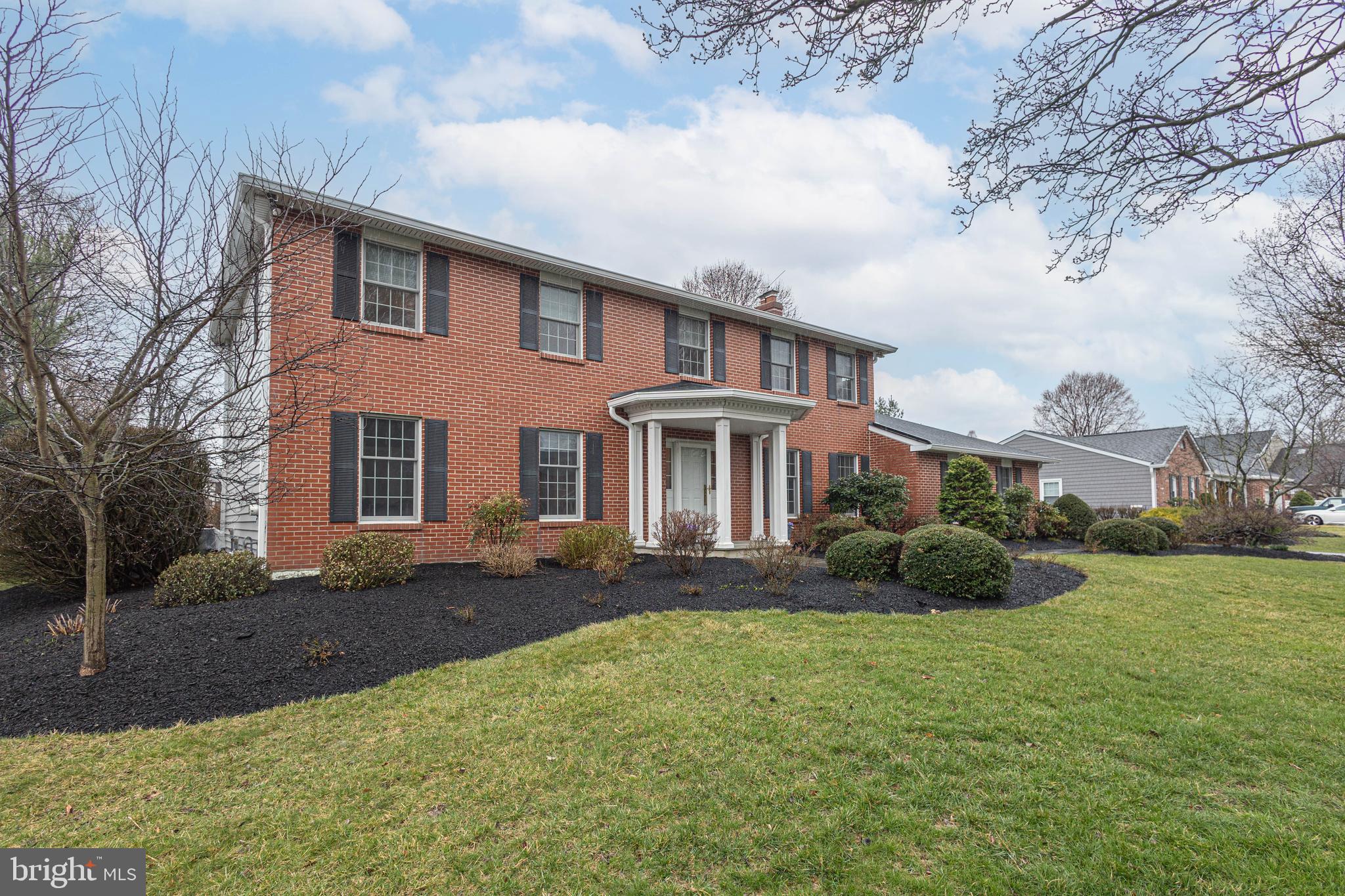 649 Teich Drive Yardley, PA 19067 - Photo 2 of 63 a front view of a house with a yard and garage