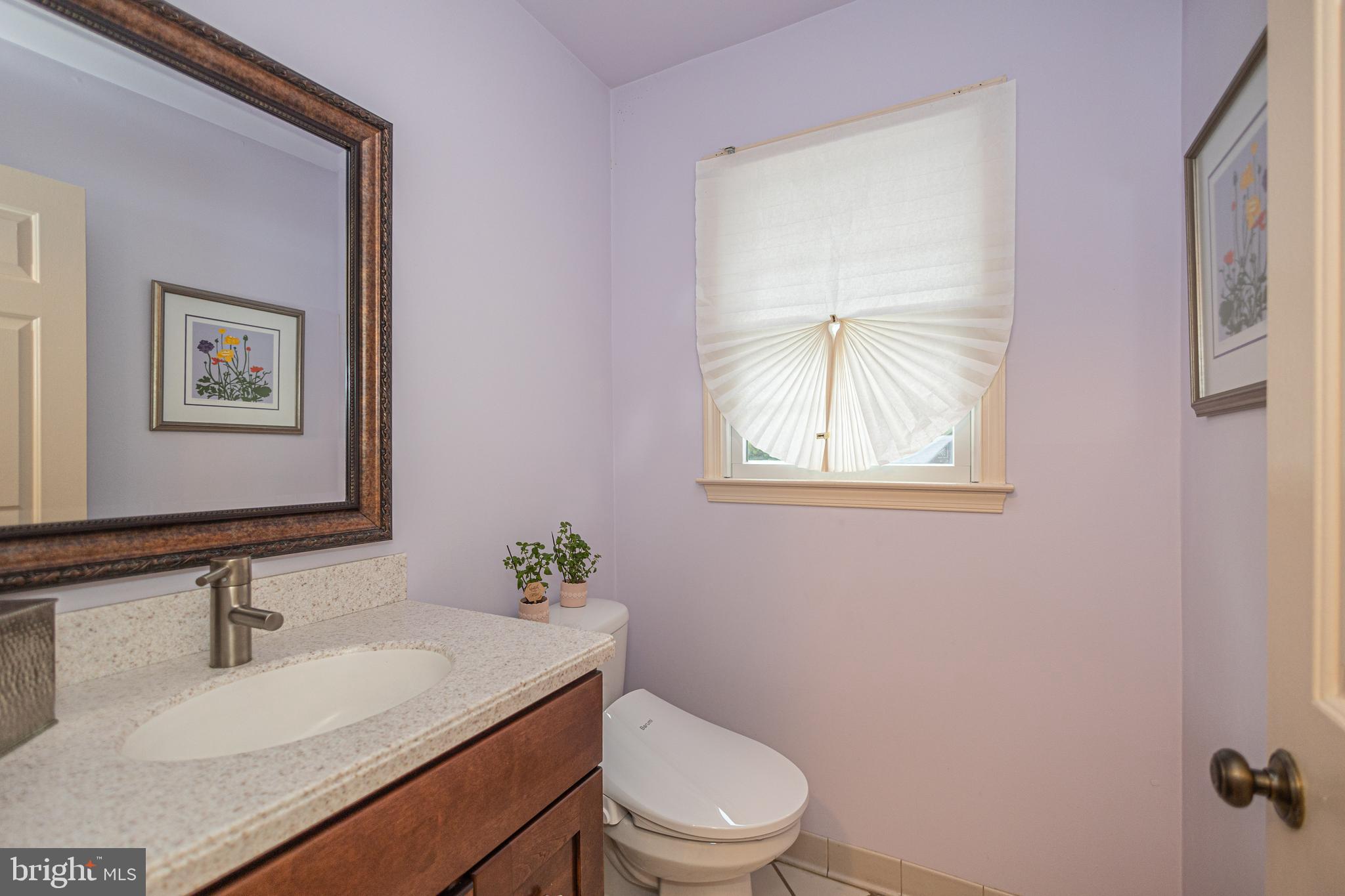 649 Teich Drive Yardley, PA 19067 - Photo 27 of 63 a bathroom with a sink vanity mirror and toilet