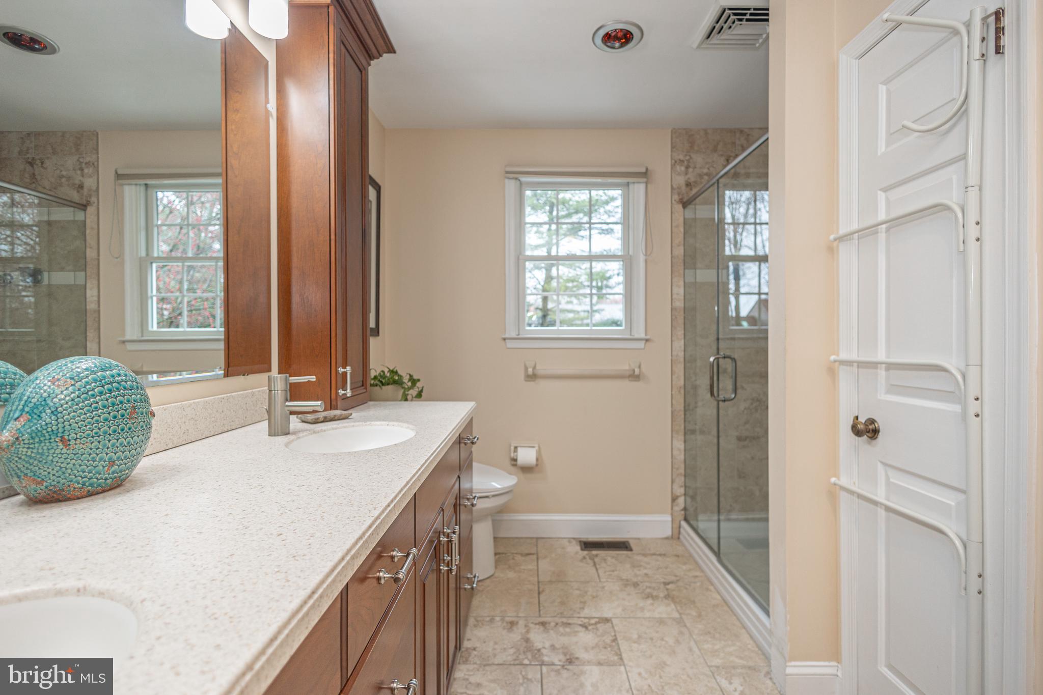 649 Teich Drive Yardley, PA 19067 - Photo 32 of 63 a bathroom with a double vanity sink toilet and shower