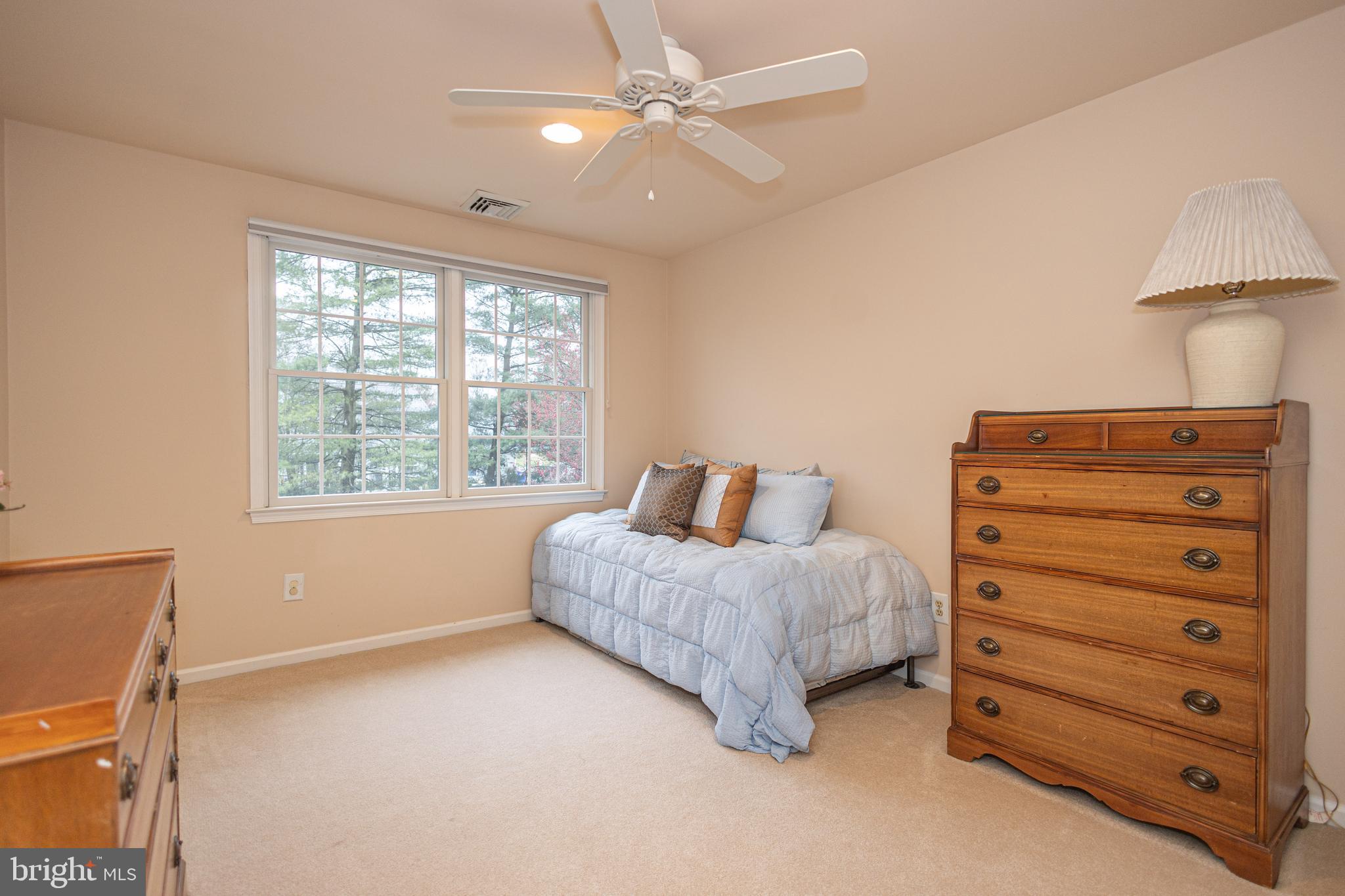 649 Teich Drive Yardley, PA 19067 - Photo 35 of 63 a bedroom with a bed and a window