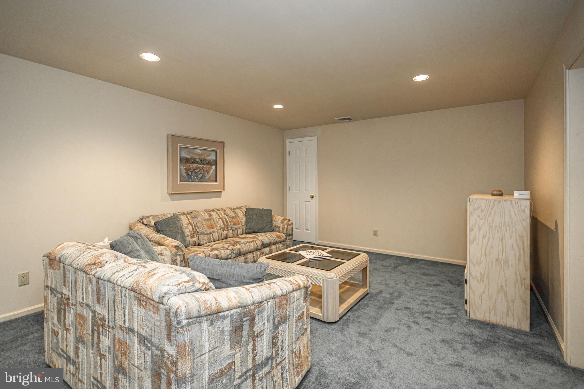 649 Teich Drive Yardley, PA 19067 - Photo 39 of 63 a living room with furniture and a couch
