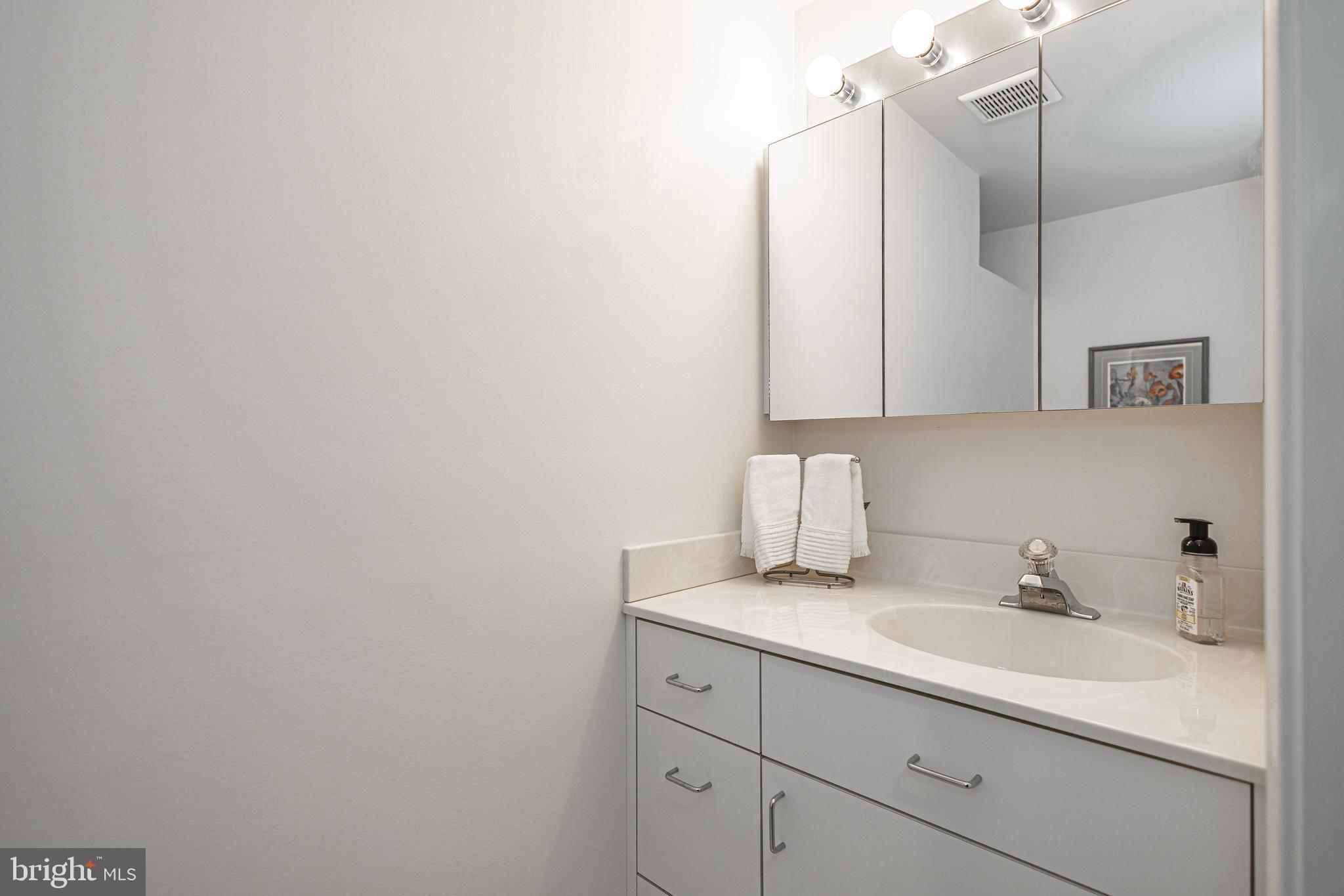 649 Teich Drive Yardley, PA 19067 - Photo 43 of 63 a bathroom with a sink and a mirror