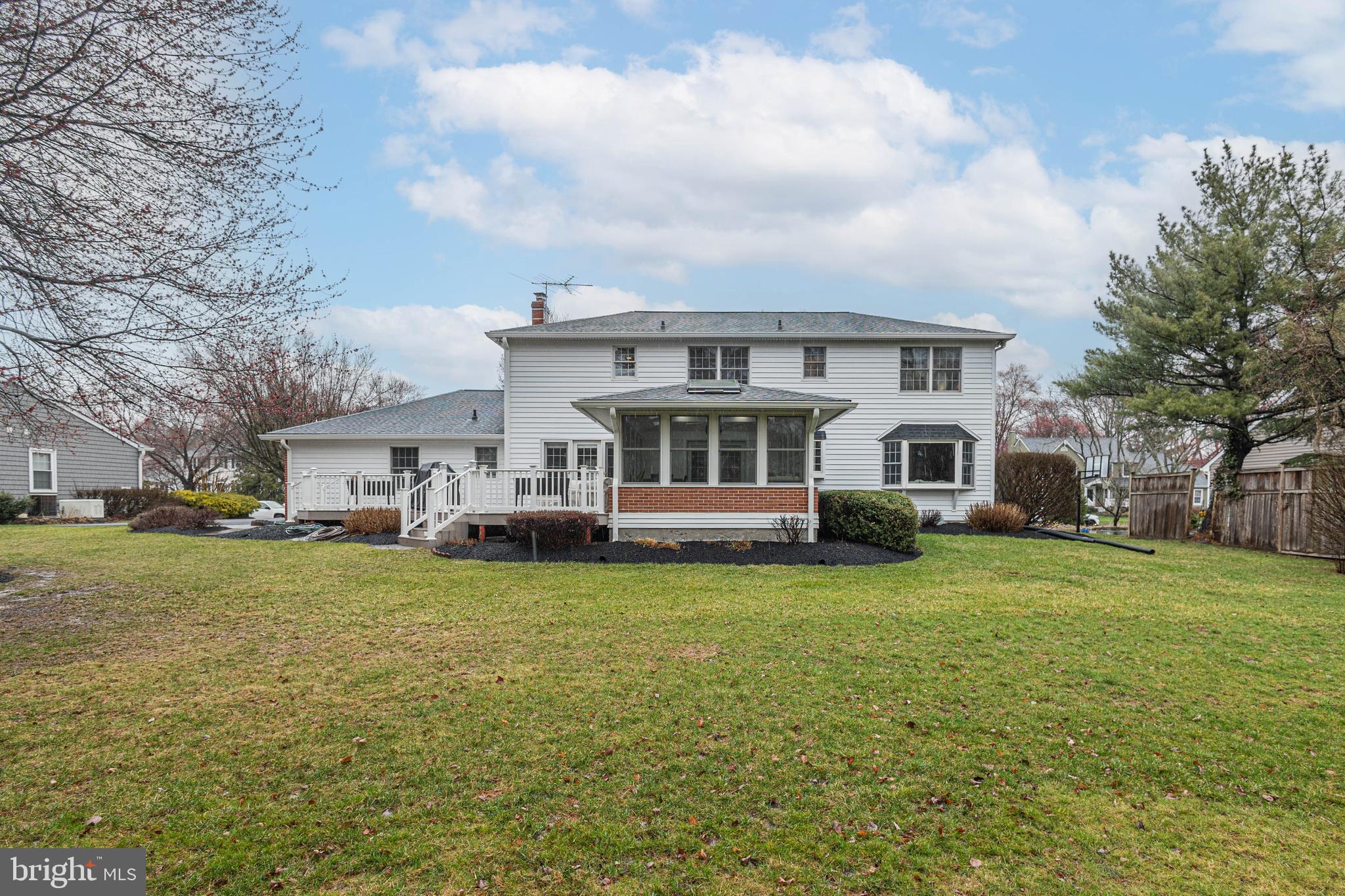 649 Teich Drive Yardley, PA 19067 - Photo 45 of 63 a view of a house with a big yard and large trees