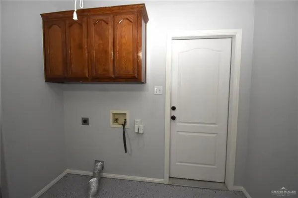 a bathroom with a shower and cabinets