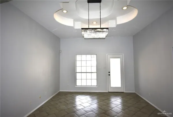 a view of a room with a chandelier