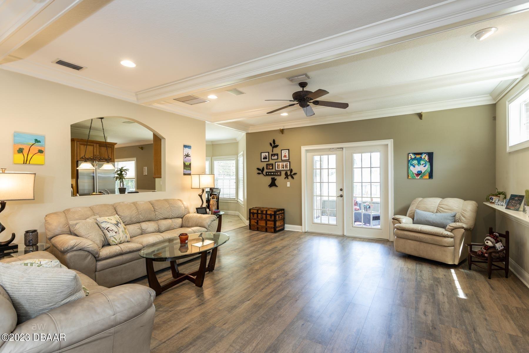 10 Foxhunter Flat Ormond Beach, FL 32174 - Photo 11 of 41 a living room with furniture and wooden floor