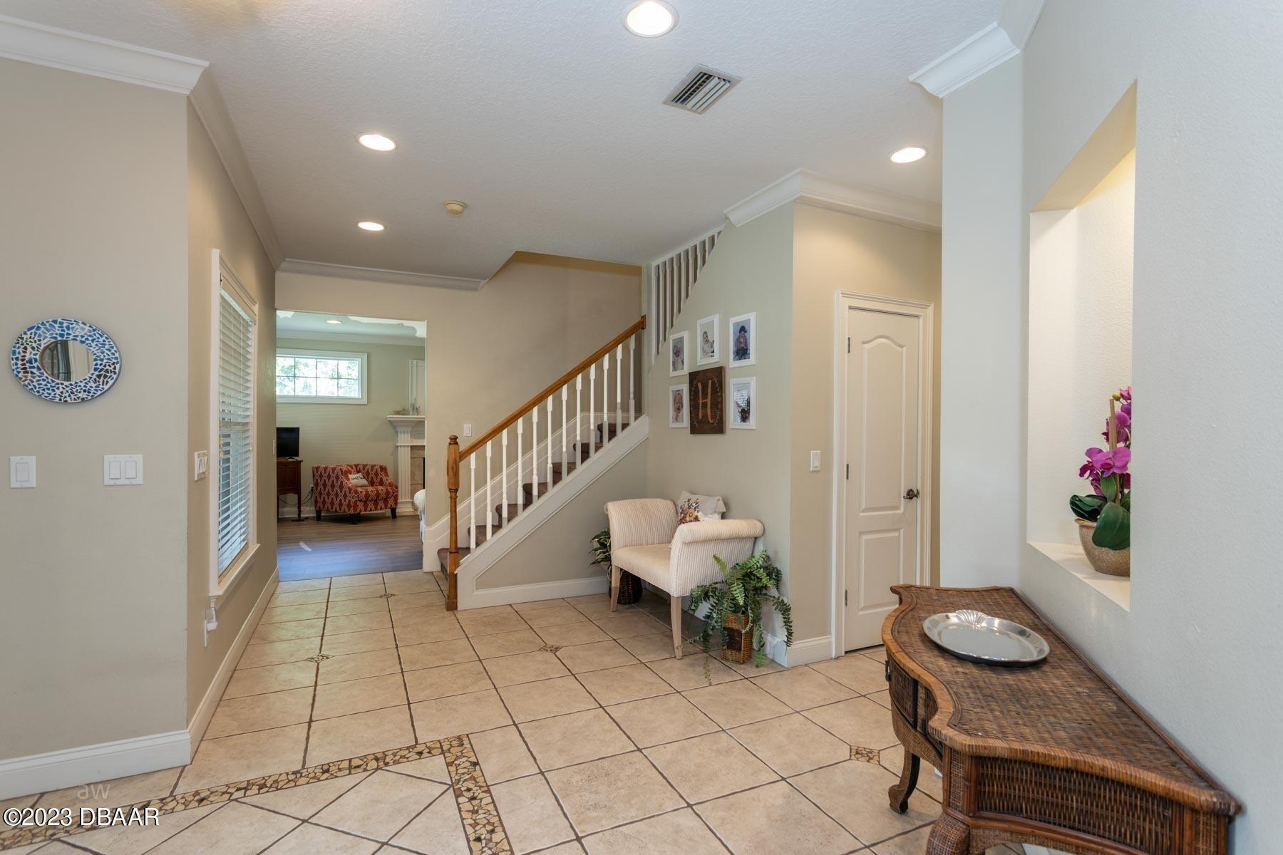 10 Foxhunter Flat Ormond Beach, FL 32174 - Photo 15 of 41 a view of entryway with livingroom and furniture