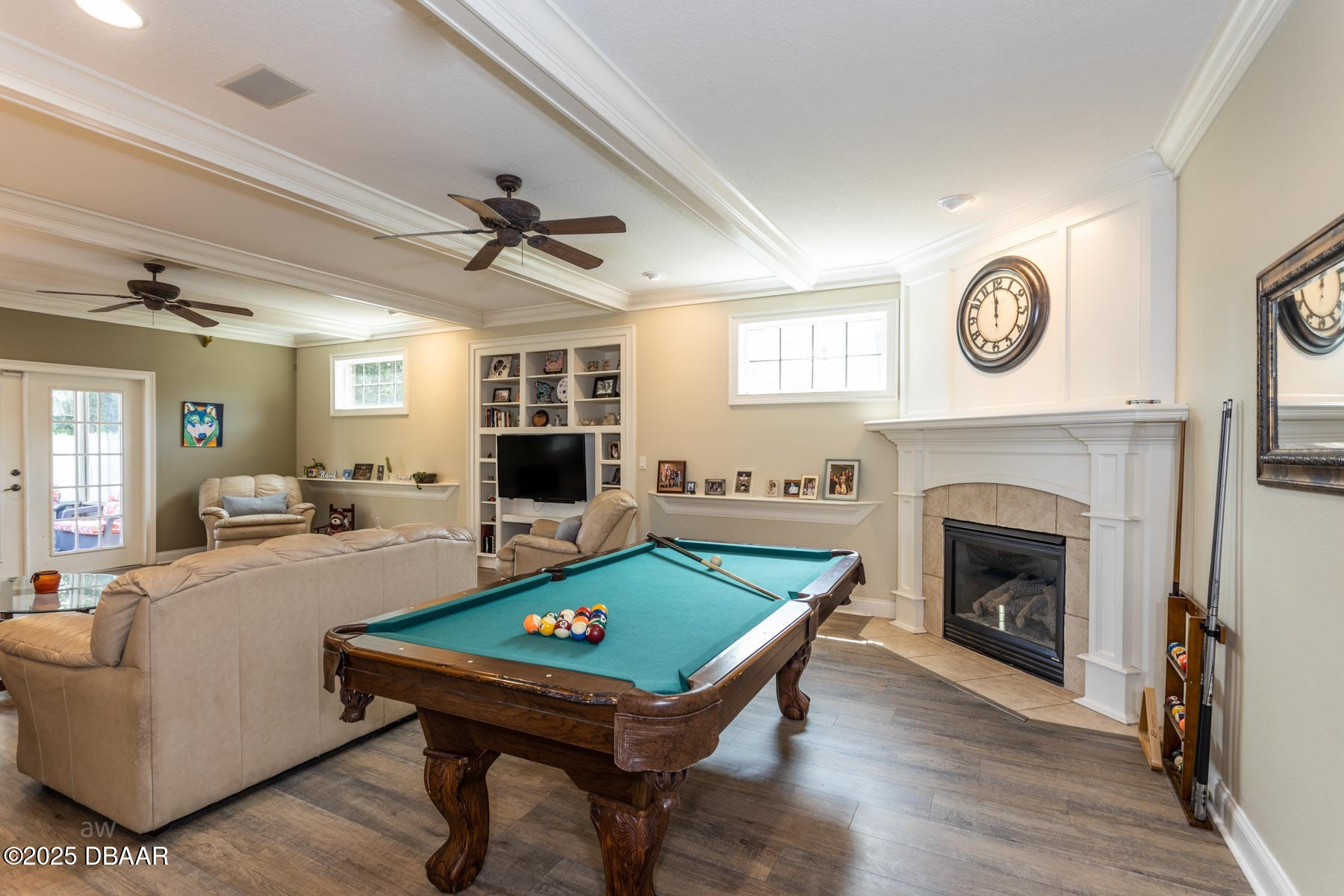 10 Foxhunter Flat Ormond Beach, FL 32174 - Photo 16 of 41 a living room with furniture a table and a fireplace