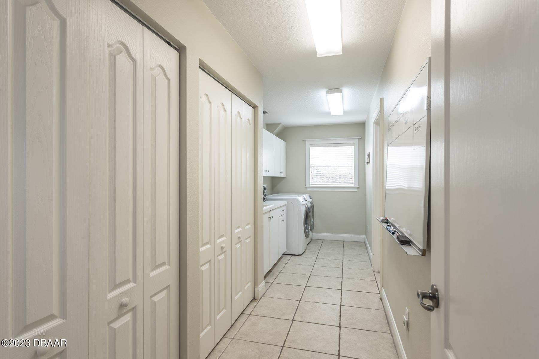 10 Foxhunter Flat Ormond Beach, FL 32174 - Photo 30 of 41 a bathroom with a glass door shower a sink and a mirror