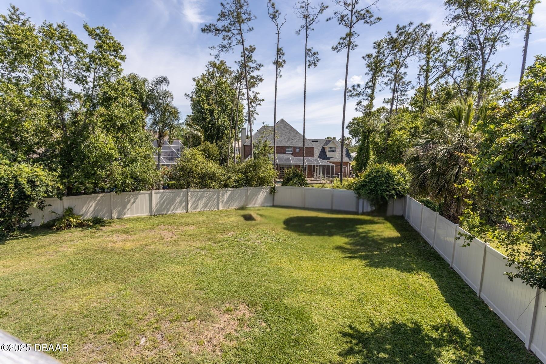 10 Foxhunter Flat Ormond Beach, FL 32174 - Photo 38 of 41 a view of a swimming pool with a yard