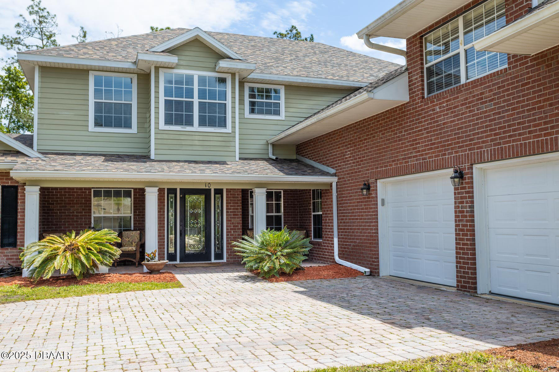 10 Foxhunter Flat Ormond Beach, FL 32174 - Photo 8 of 41 a view of a house with potted plants