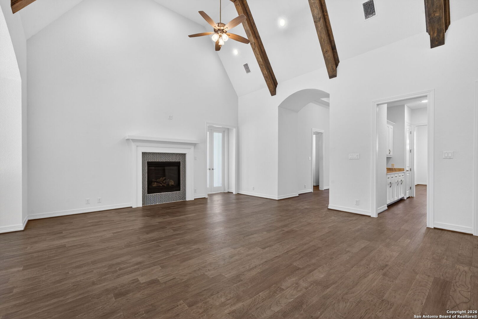 28640 Bull Gate Boerne, TX 78015 - Photo 11 of 40 a view of empty room with wooden floor and fireplace