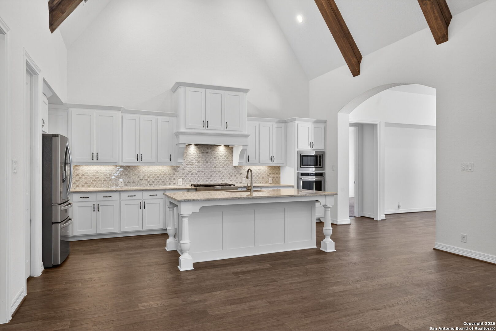 28640 Bull Gate Boerne, TX 78015 - Photo 13 of 40 a kitchen with a refrigerator stove top oven and sink