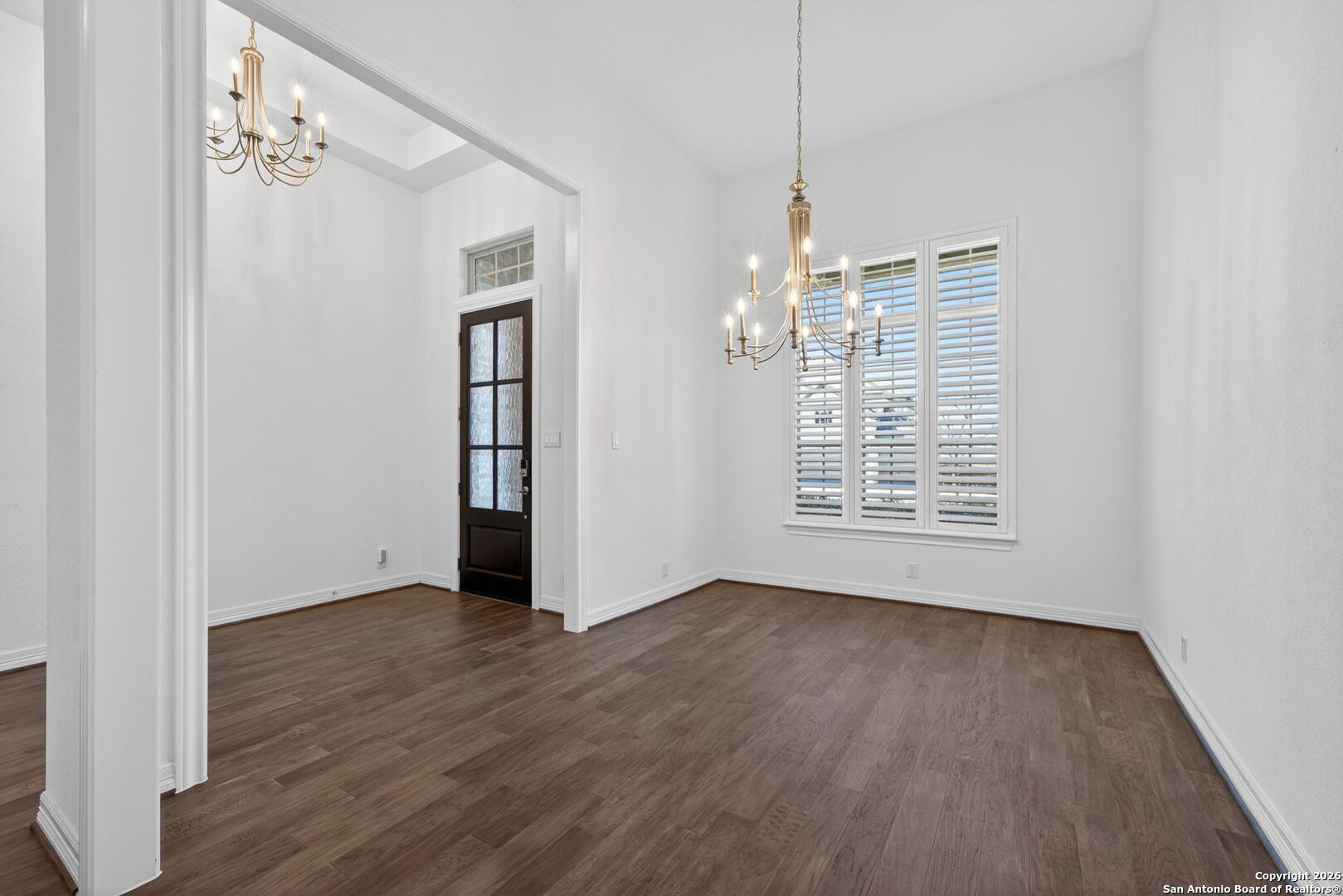 28640 Bull Gate Boerne, TX 78015 - Photo 18 of 40 a view of an empty room with wooden floor and a window