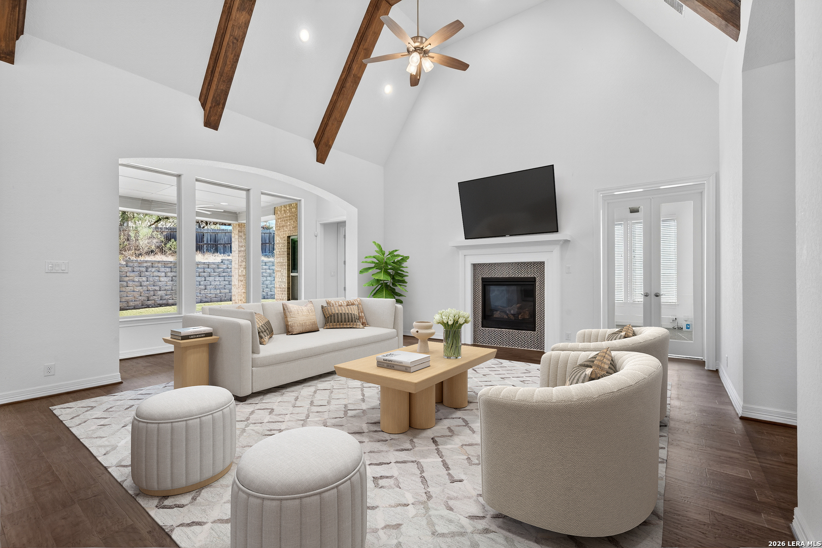 28640 Bull Gate Boerne, TX 78015 - Photo 2 of 40 a living room with fireplace furniture and a flat screen tv