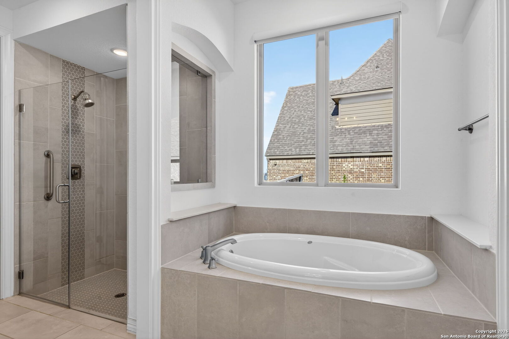 28640 Bull Gate Boerne, TX 78015 - Photo 26 of 40 a white bath tub sitting next to a shower