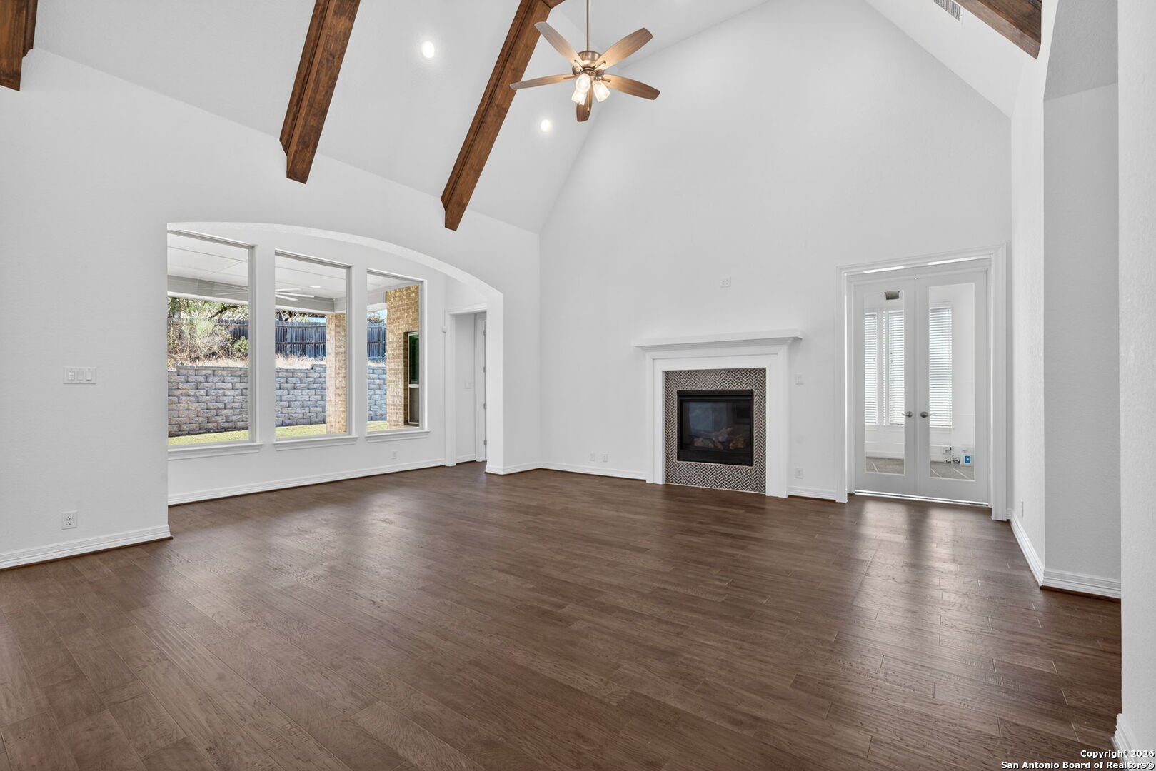 28640 Bull Gate Boerne, TX 78015 - Photo 10 of 40 a view of an empty room with wooden floor and a window