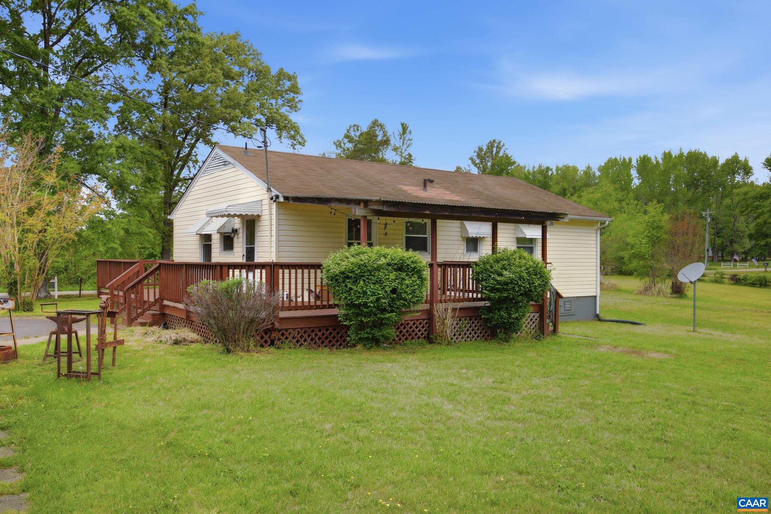 3590 Belle Meade Road Bumpass, VA 23024 - Photo 16 of 21 a house view with a garden space