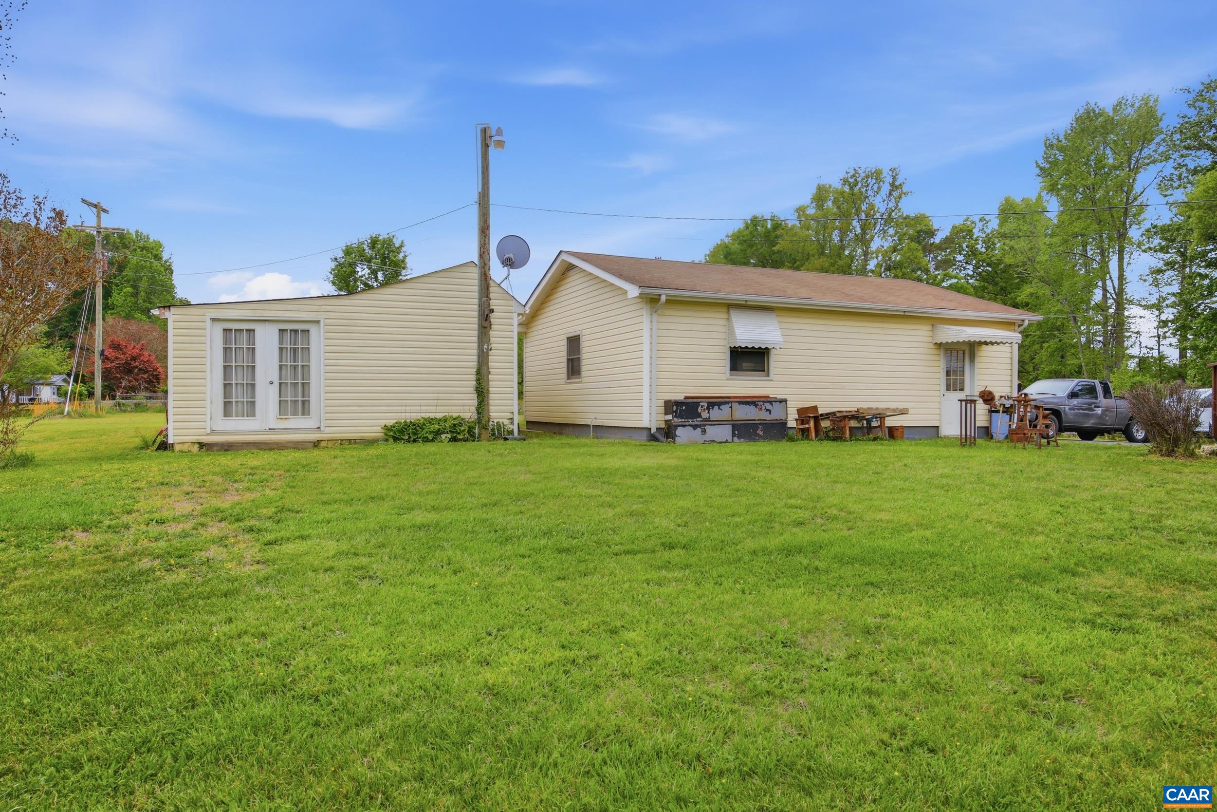 3590 Belle Meade Road Bumpass, VA 23024 - Photo 18 of 21 a front view of house with yard and green space