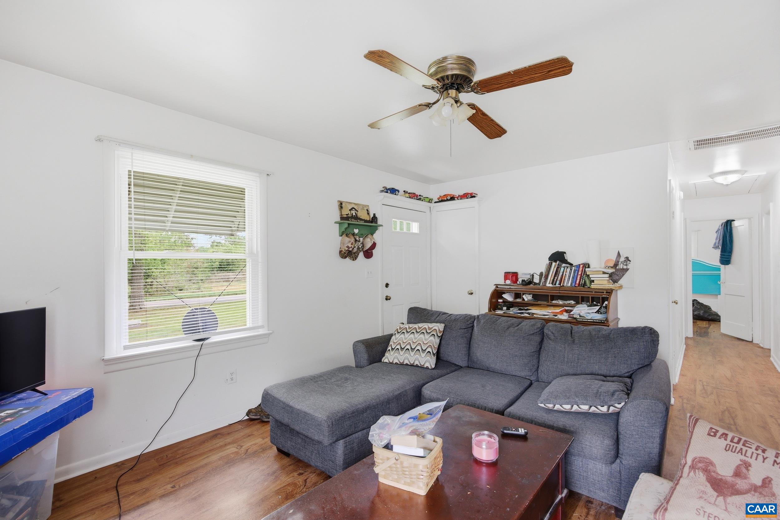3590 Belle Meade Road Bumpass, VA 23024 - Photo 6 of 21 a living room with furniture and a window