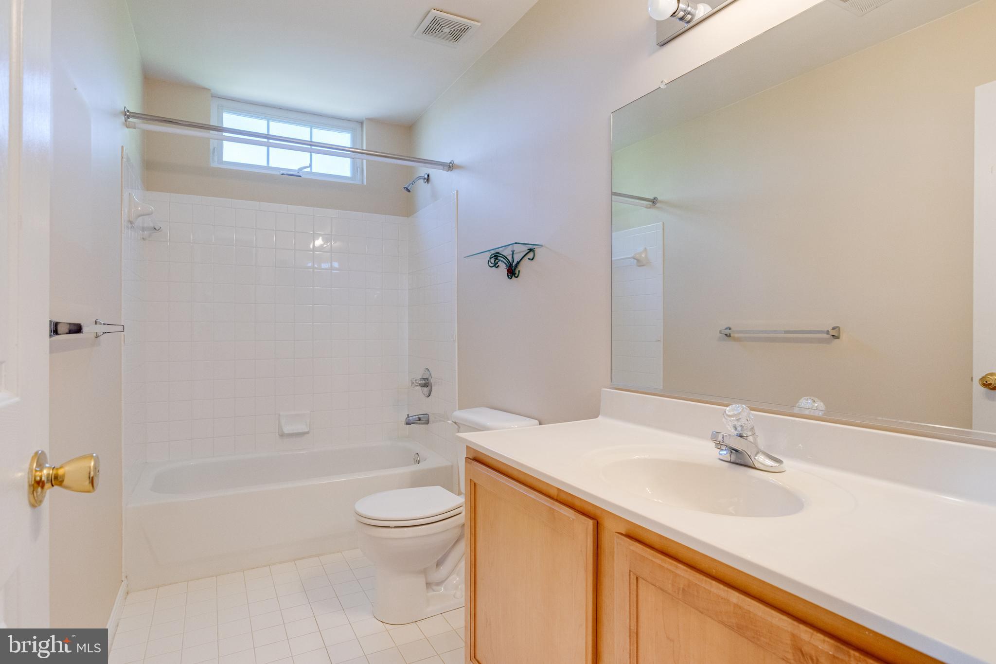 1 Broadbridge Road White Marsh, MD 21237 - Photo 69 of 104 Full Hall Bath with Tile Surround