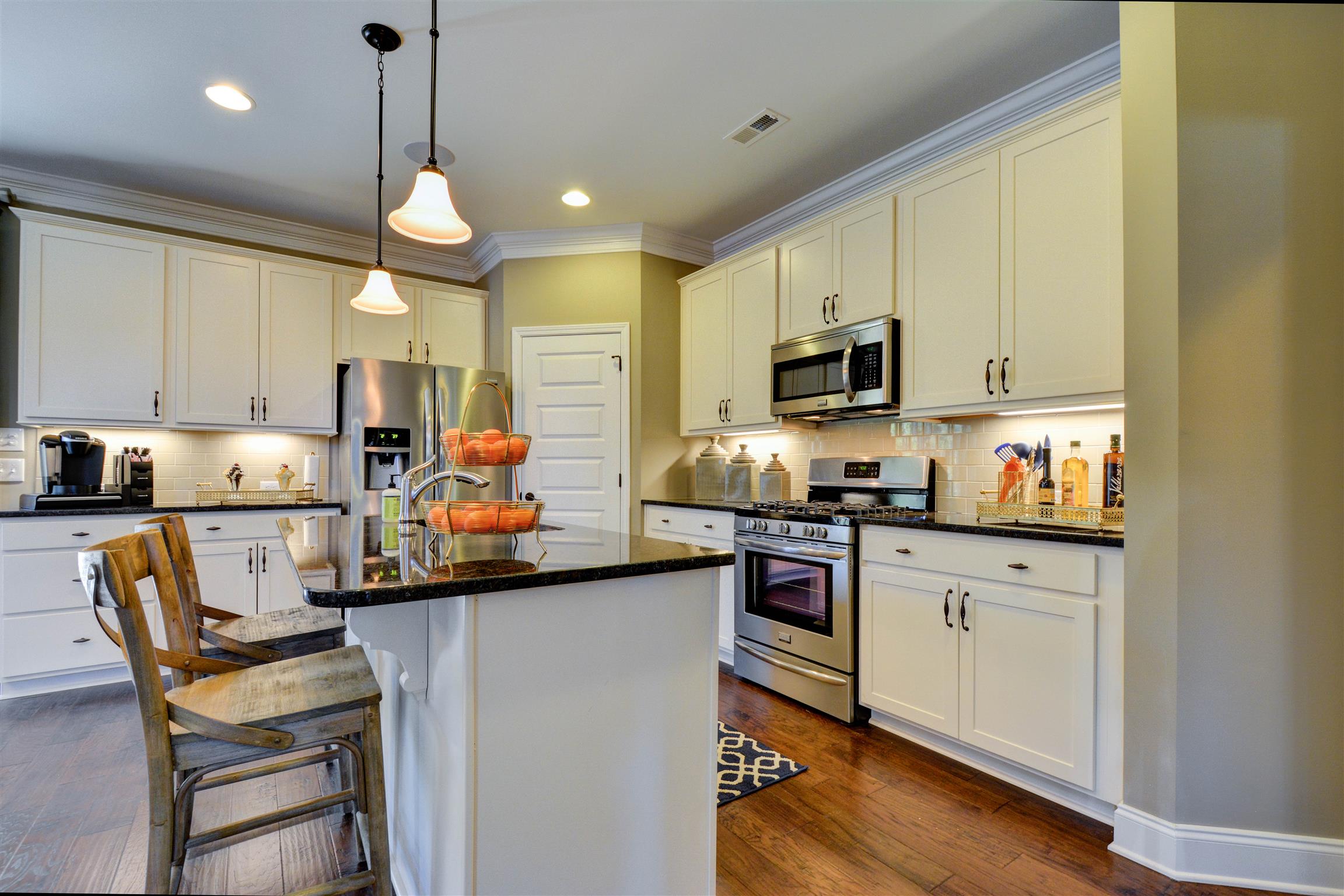 422 Quarry Road Gallatin, TN 37066 - Photo 11 of 29 The kitchen features an eat-on island and is combined with the dining area. *Photos are of a model home. Actual finishes may vary.*