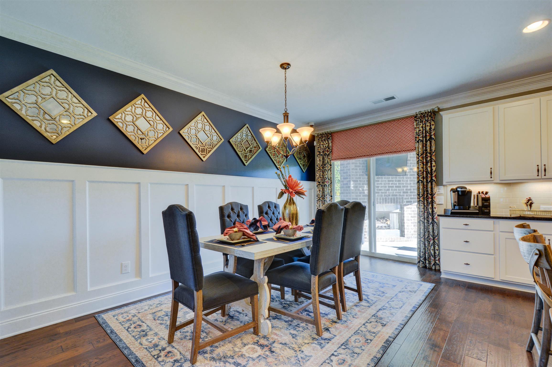 422 Quarry Road Gallatin, TN 37066 - Photo 14 of 29 The kitchen features an eat-on island and is combined with the dining area. *Photos are of a model home. Actual finishes may vary.*