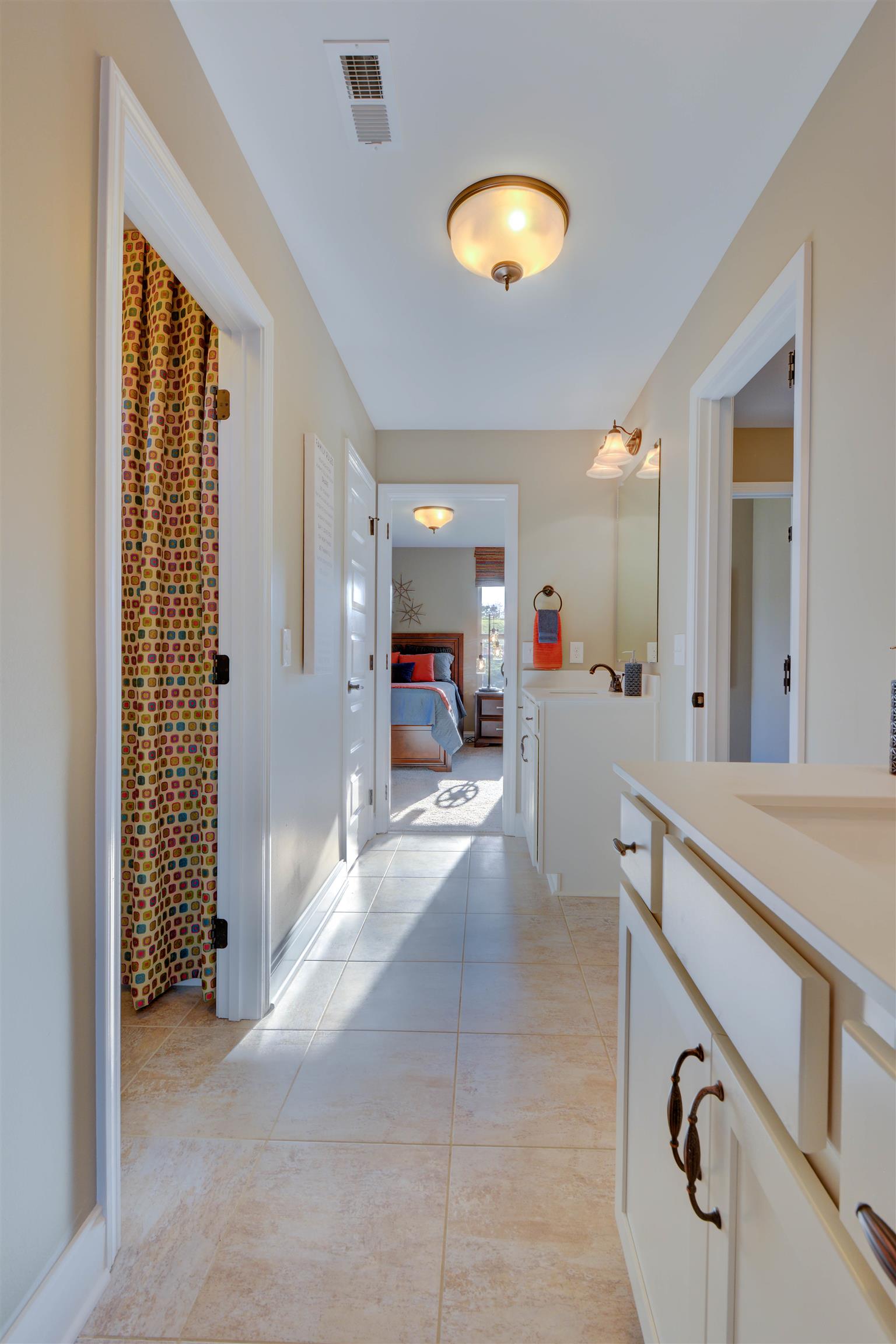 422 Quarry Road Gallatin, TN 37066 - Photo 19 of 29 The Jack & Jill bathroom upstairs connects bedrooms 3 & 4. *Photos are of a model home. Actual finishes may vary.*