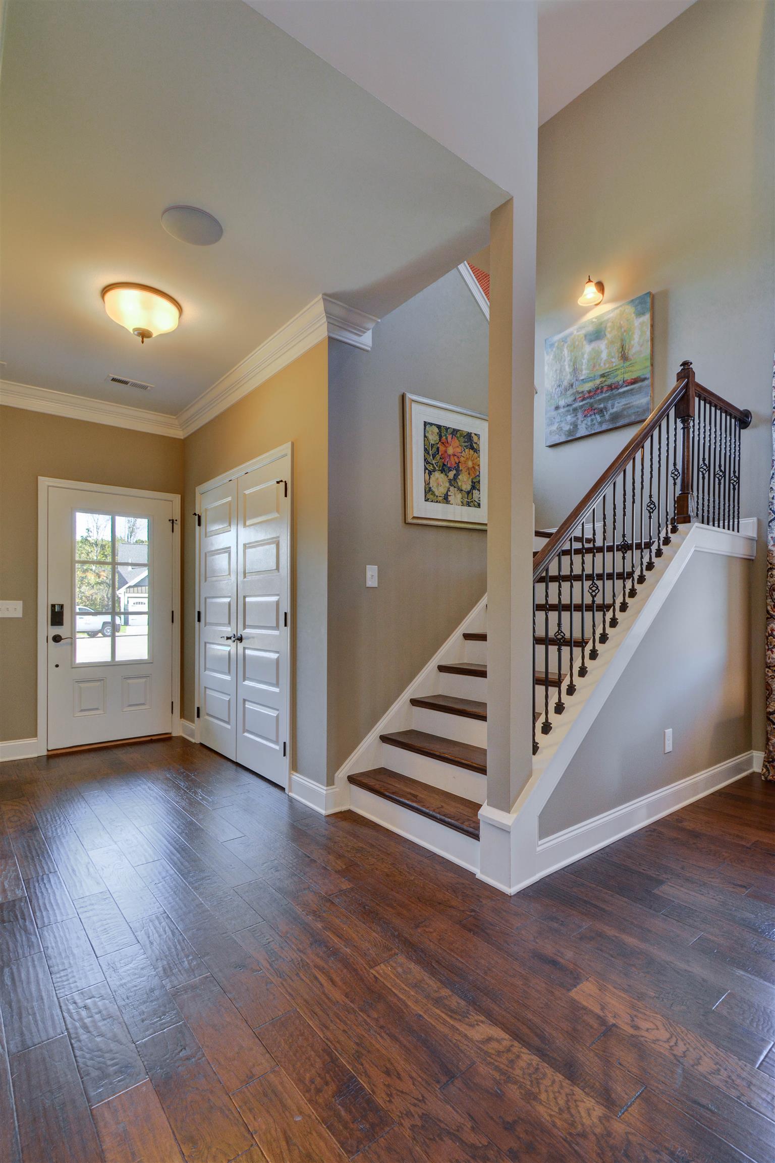 422 Quarry Road Gallatin, TN 37066 - Photo 7 of 29 The foyer leading into the great room includes a large coat closet and half bath. *Photos are of a model home. Actual finishes may vary.*