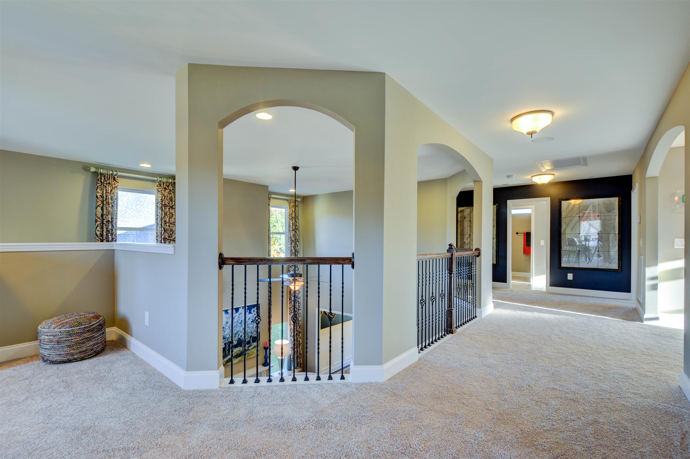 422 Quarry Road Gallatin, TN 37066 - Photo 9 of 29 The catwalk hallway overlooks the great room and leads to the bonus room and secondary bedrooms and bathrooms. *Photos are of a model home. Actual finishes may vary.*