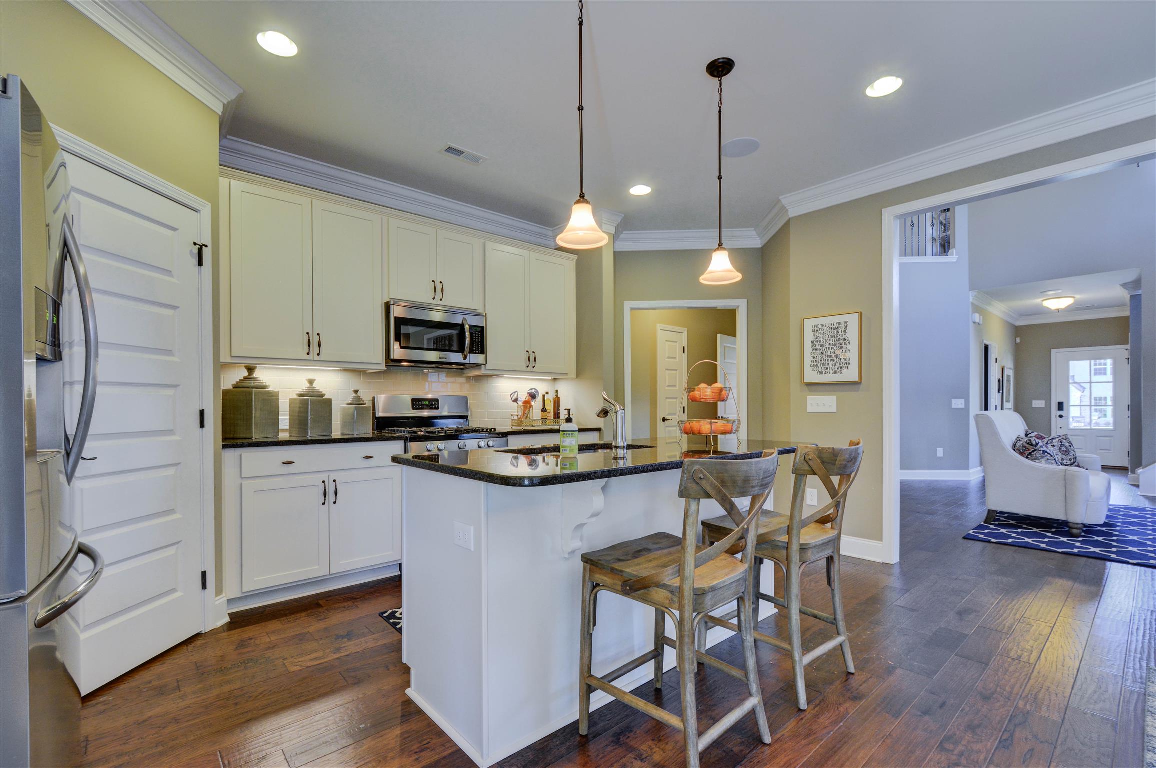 422 Quarry Road Gallatin, TN 37066 - Photo 10 of 29 The kitchen features an eat-on island and is combined with the dining area. *Photos are of a model home. Actual finishes may vary.*