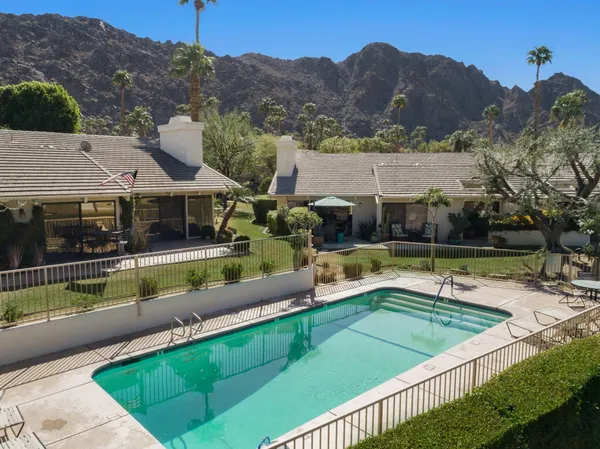 a view of a house with a swimming pool