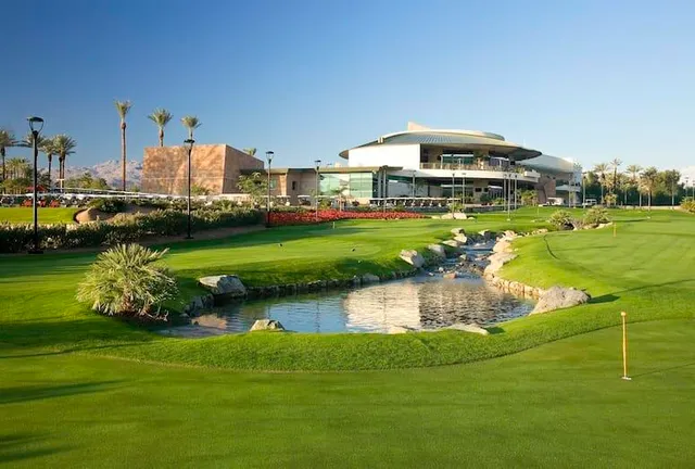 a view of a lake with a house in the background