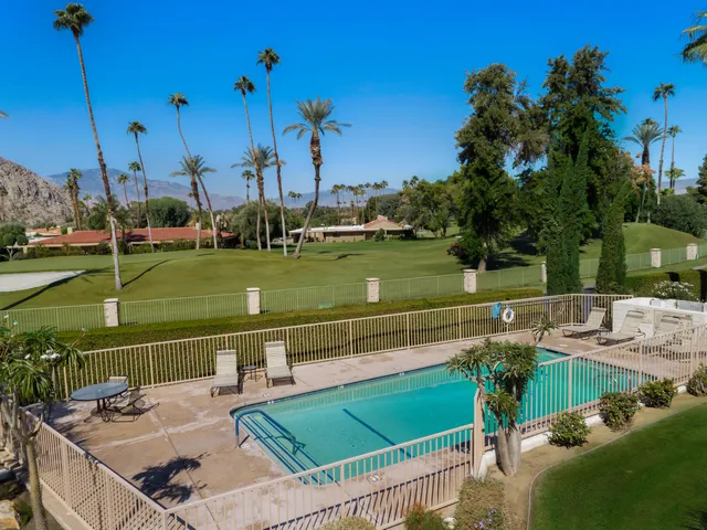 a view of a terrace with chairs